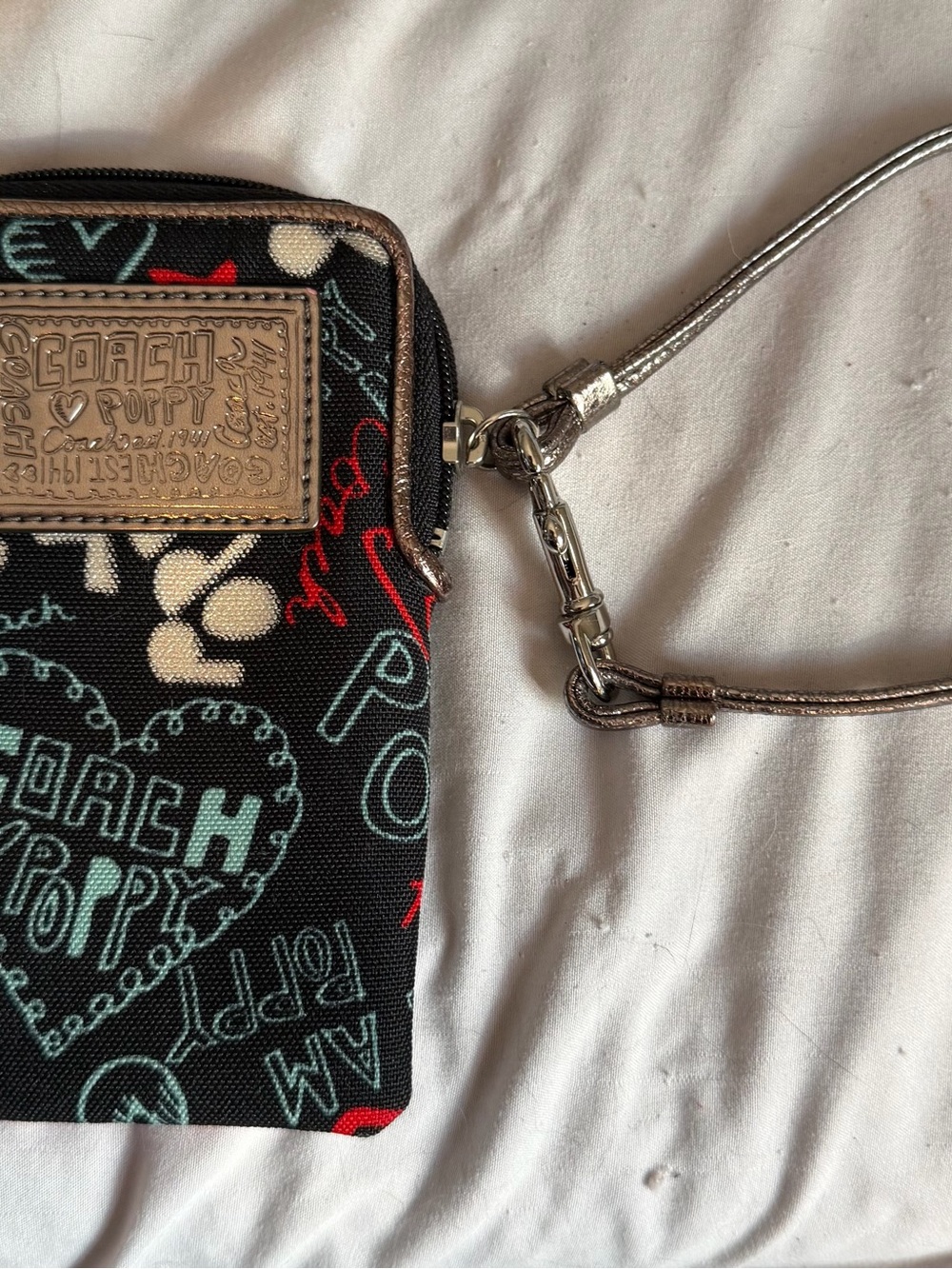 Coach Black Poppy Graphic Wristlet Phone Pouch with Metallic Silver Strap